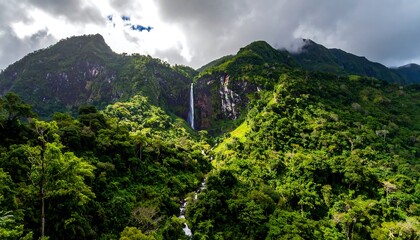 Majestic Waterfall Cascading Down Lush Green Mountain in Tropical Rainforest.