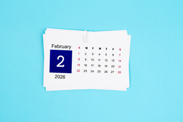February Calendar 2026 page on blue background.