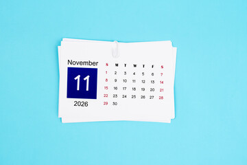 November Calendar 2026 page on blue background.