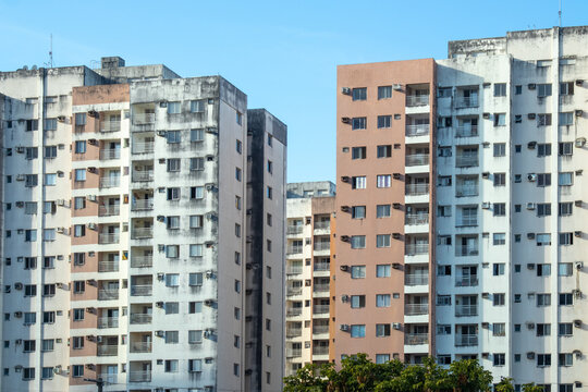 A collection of modern residential buildings in an urban area.