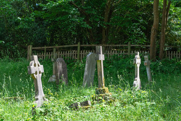 Brockenhurst, UK - May 31st 2025: Graves in St Nicholas&rsquo; Churchyard.