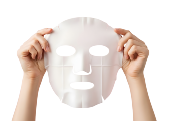 Hands holding a white facial mask sheet with cutouts for eyes and mouth isolated on transparent background