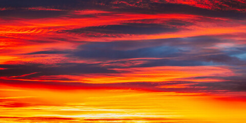 Abstract Saturated Orange-yellow Colors Of Clouds. Unusual Sky Background. Rich Orange Colors....
