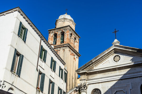 Venice, Italy - 10.11.2024: San Simeone Profeta church with bell tower and classical facade in Venice.