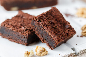 Homemade chocolate brownies with walnuts. Truffle pie. Delicious dessert close-up. Selective focus