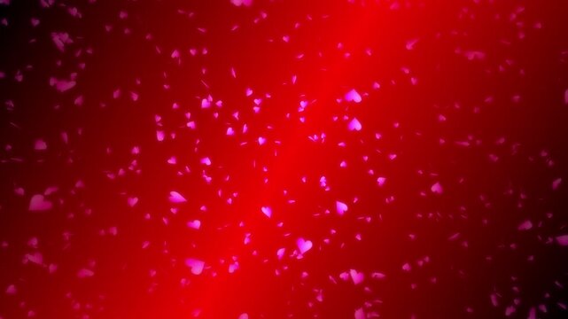 Pink heart shapes being lit up and falling down on red gradient background. Abstract background for Happy Valentine's day and wedding ceremony.