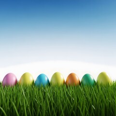 Colorful easter eggs in a lush green grassy field on a sunny day with a clear blue sky
