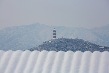Yuquan Mountain and Yufeng Pagoda landscape after snow, Beijing, China