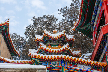 Magnificent Chinese pavilion in the ancient architecture snowscape of Huazhongyou, Summer Palace, Beijing, China