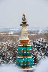 Four Great Regions ancient architecture after snow at the Summer Palace, Beijing, China