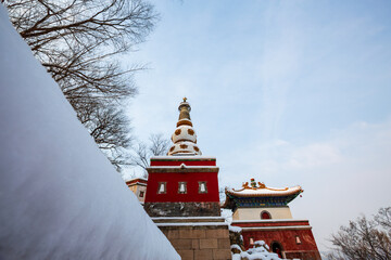 Four Great Regions ancient architecture after snow at the Summer Palace, Beijing, China