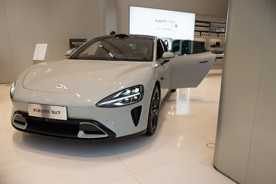 Guangzhou, China &ndash; 1 December 2025: Xiaomi SU7 is a flagship sport electric car in the store.