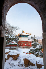 Four Great Regions ancient architecture after snow at the Summer Palace, Beijing, China