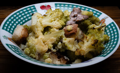 Delicious second course based on bread croutons, sausage and green cabbage 1