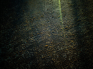 Light leak on the textured ground backdrop