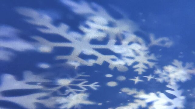 Abstract snow movement is captured with glowing light effects. Creative winter visualization.