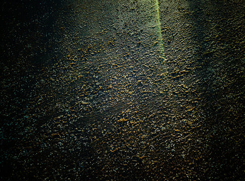 Light leak on the textured ground backdrop