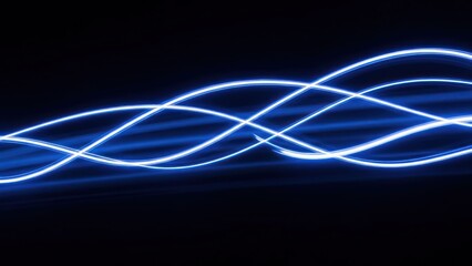 Abstract blue light trails weave across a dark background, suggestive