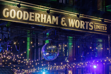 Naklejka premium Vintage Gooderham and Worts Limited sign on an old structure, Distillery District, Toronto, Canada