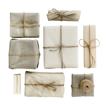 Set of wrapped gifts in beige paper with string and rope ties isolated on Transparent Background