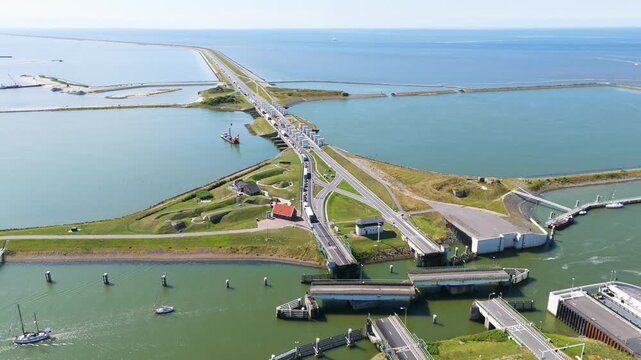 sprawling engineering defines lorentzsluizen causeway stretches horizon structure separates north sea interior waters afsluitdijk netherlands from toward ijsselmeer water barrier 