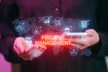 Hands hold phone while project management concepts appear with digital graphics on screen