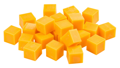 Close-up of a pile of bright orange, uniformly cut cubes, possibly food