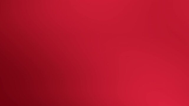 Solid red background with gradient lighting effects. Suitable for abstract design projects, festive presentations, and vibrant graphic compositions. Bright and eyecatching. 4K Video Footage.