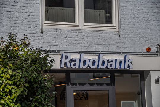 Middelburg, Netherlands  21 March 2025,  The brand logo of the Dutch bank "Rabobank" in front of a branch.