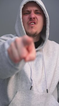 An abuser mocks and humiliates someone.
Humiliation of a weak person who cannot stand up for themselves.
An abuser points a finger at the humiliated person.
Violence, abuse, suffering, humiliation, be