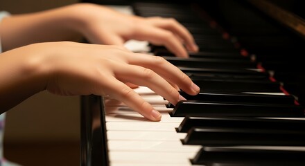 Obraz premium Hands playing piano keys in a focused musical performance.