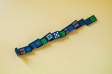 Dominoes game on a color background.Selective focus.