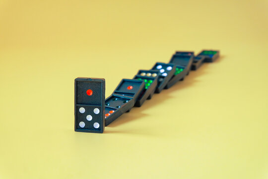 Dominoes game on a color background.Selective focus.
