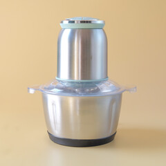 Set of food grinder for minced beef and vegetables on background.