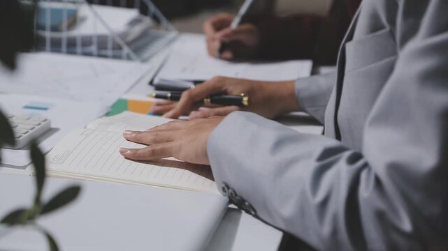 Asian male financial officer or accountant checking investment results Financial budget analysis Planning to summarize results and report to the meeting Audit concept and investment results.