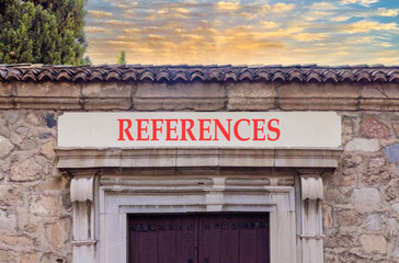 Fototapeta premium References or reference symbol. Concept word References on beautiful white marble sign plate. Beautiful ancient stone wall and sunset background. Business references or reference concept. Copy space.