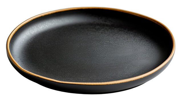 Black ceramic plate with a brushed gold rim is isolated on a transparent background. This design can be used for various food presentations and settings in different styles