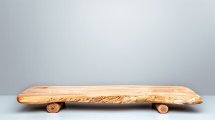 Custombuilt wooden stage showcasing unrefined edges and visible wood grain for item display