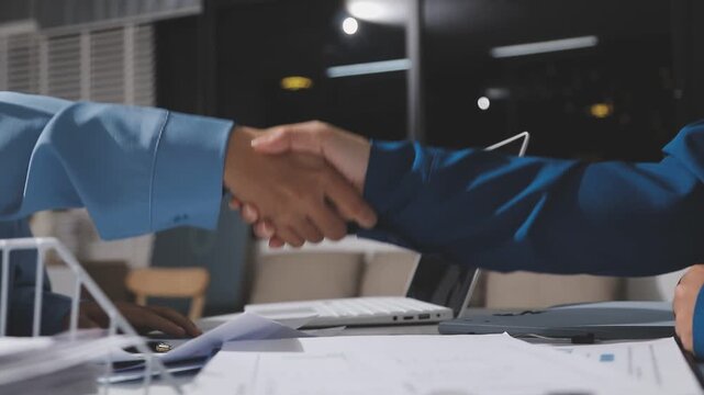 Asian male financial officer or accountant checking investment results Financial budget analysis Planning to summarize results and report to the meeting Audit concept and investment results.