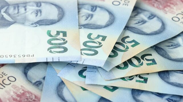 Mexico money rotating, Lot of 500 Mexican pesos banknotes, Concept of financial success, lottery or big win