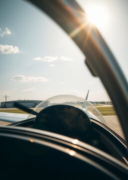 Sports airplane on a sunny summer day at airport straubing bavaria germany cockpit airplane cockpit aircraft flight technology transportation aviation travel jet airline