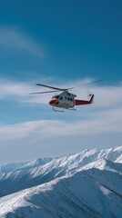 Rescue Helicopter Hovering Above Snowy Mountain Peaks in Bright Blue Sky