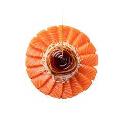 Sliced salmon arranged in a circular pattern with soy sauce in the center, viewed from above