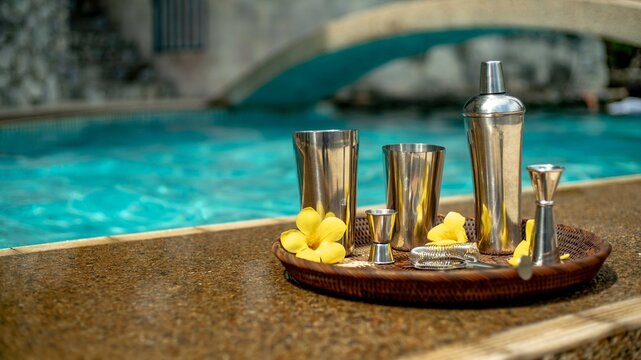 swimming pool in the hotel with cocktail instruments