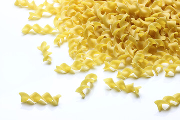 Uncooked Egg Noodles isolated on white background