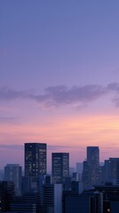 Obraz premium Modern High Rise Towers Emerging Through Mist at Dawn in Urban Landscape