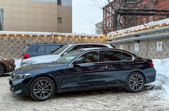 Blue BMW 3 Seventh generation, G20, manufactured and marketed by BMW. Blue BMW 3 series 320d xDrive G20 with M Performance package in the city street. German sport car.