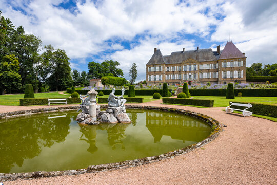 Chateau de Dracy Saint Loup and formal garden with fountain