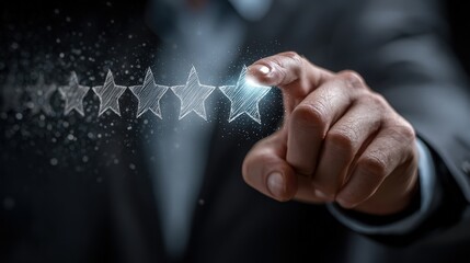 Hand reaching out to select a star rating to show customer satisfaction in a business setting during daytime