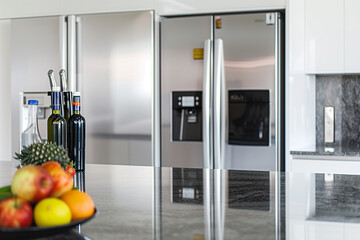 A refrigerator with a microwave and a wine rack